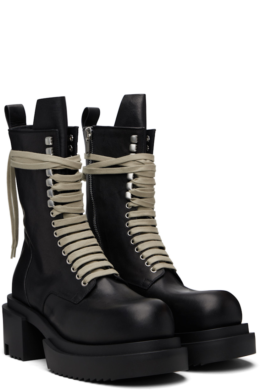 Mid-calf vegetable-tanned buffed calfskin boots. 

· LWG-certified calfskin
· Wraparound lace-up closure
· Zip closure inner side
· Pull-loop at heel collar 
· Rubber block heel and platform midsole 
· Treaded rubber sole 
· Platform: H1.75"
· Heel: H2.5"

Supplier color: Black