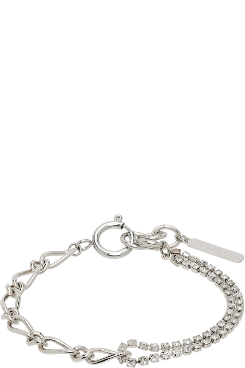 Handcrafted tiered figaro- and cup-chain bracelet in palladium-plated brass.

· Crystals at length
· Logo plaque at adjustable spring-ring fastening
· L7.75"

Supplier color: Palladium