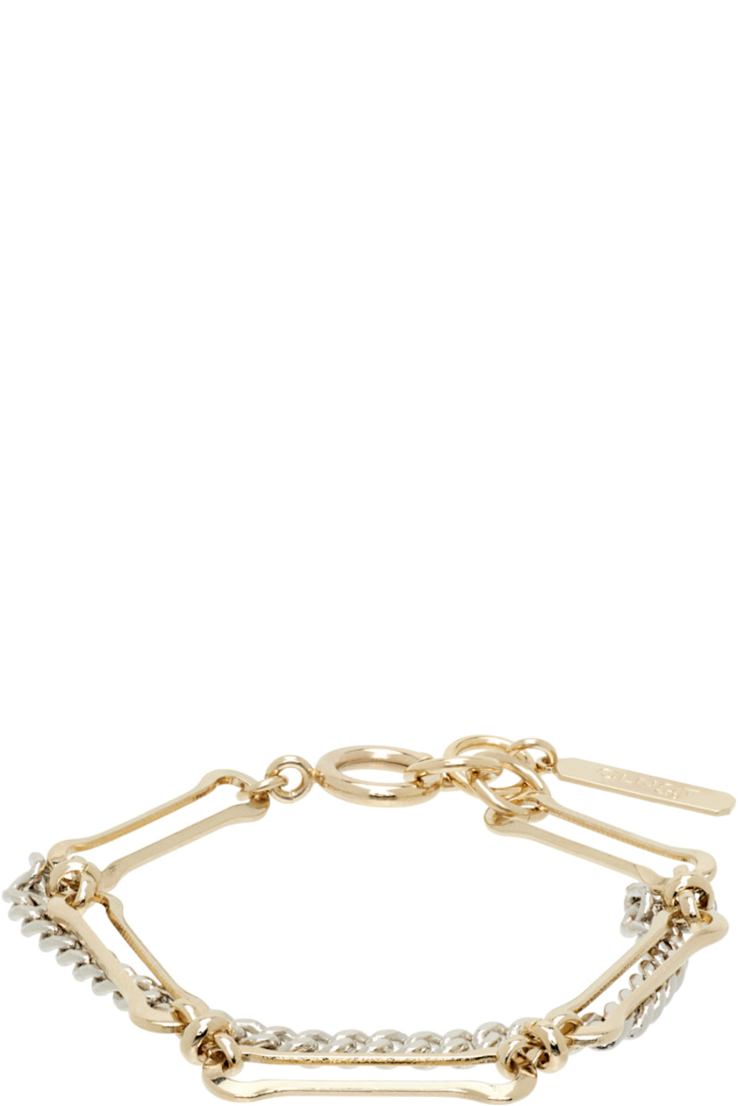 Handcrafted tiered cable chain and curb chain bracelet in 24k yellow gold- and palladium-plated brass.

· Logo plaque at adjustable spring-ring fastening
· L7"

Supplier color: Gold/Silver