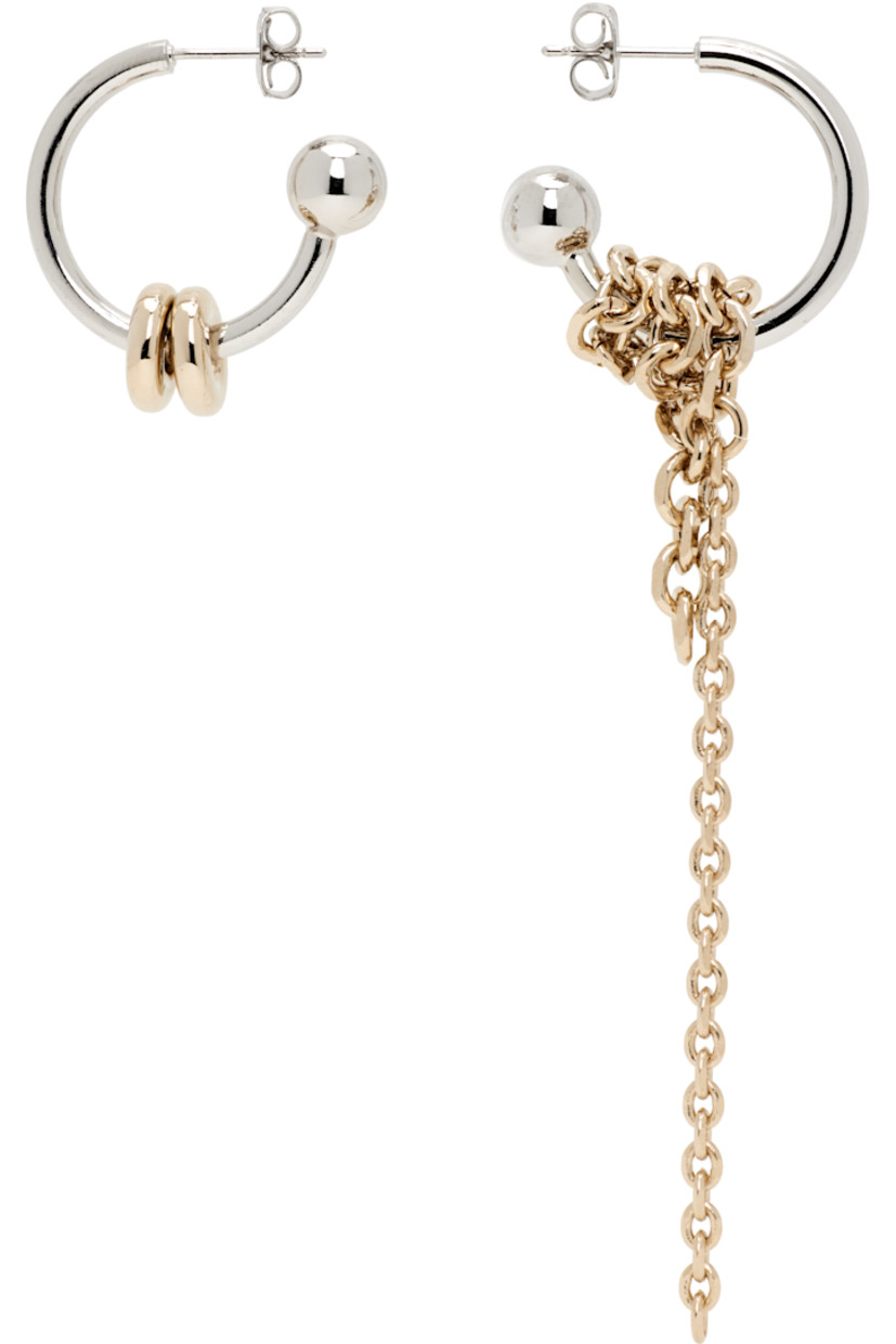 Pair of handcrafted and mismatched drop earrings in palladium- and 24k yellow gold-plated brass.

· Curb chain detailing at drop
· Post-stud fastening
· H3.5" x W1"; H1" x D1"

Supplier color: Palladium/Gold