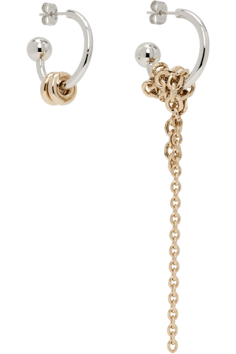 Pair of handcrafted and mismatched drop earrings in palladium- and 24k yellow gold-plated brass.

· Curb chain detailing at drop
· Post-stud fastening
· H3.5" x W1"; H1" x D1"

Supplier color: Palladium/Gold