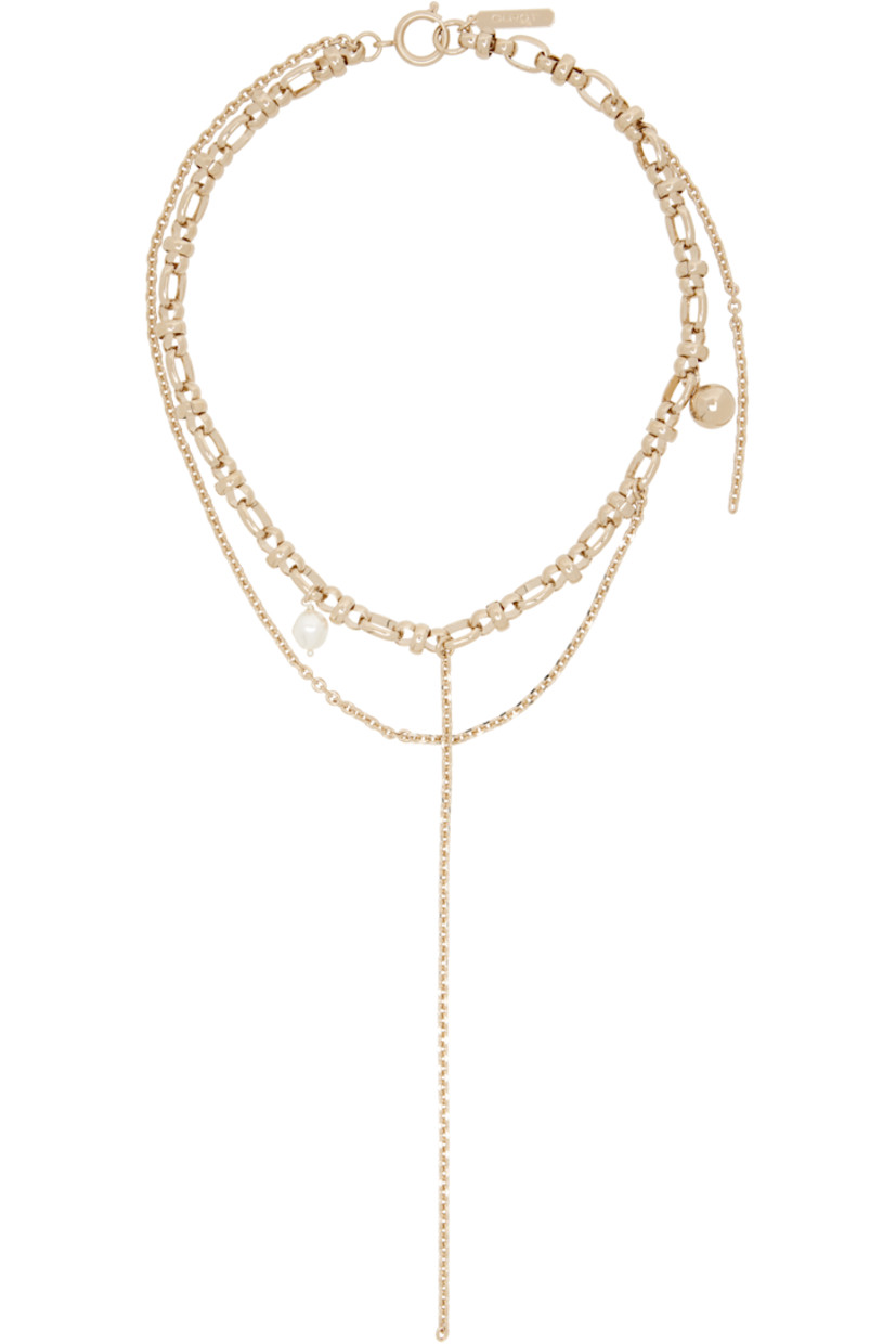Handcrafted tiered cable chain necklace in 24k yellow gold-plated brass.

· Faux-pearl and charms at length
· Chain detailing at drop
· Logo plaque at spring-ring fastening
· L15"

Available exclusively at SSENSE.

Supplier color: Gold