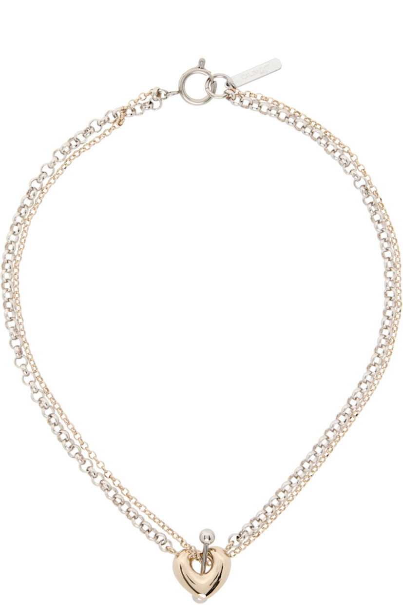 Handcrafted tiered rolo chain necklace in 24k gold- and palladium-plated brass.

· Graphic charms at drop
· Logo plaque at adjustable spring-ring fastening 
· L17"

Supplier color: Gold/Palladium