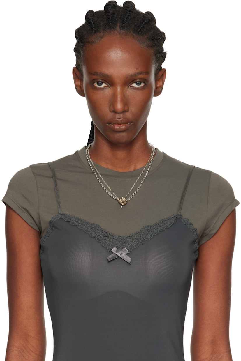 Handcrafted tiered rolo chain necklace in 24k gold- and palladium-plated brass.

· Graphic charms at drop
· Logo plaque at adjustable spring-ring fastening 
· L17"

Supplier color: Gold/Palladium