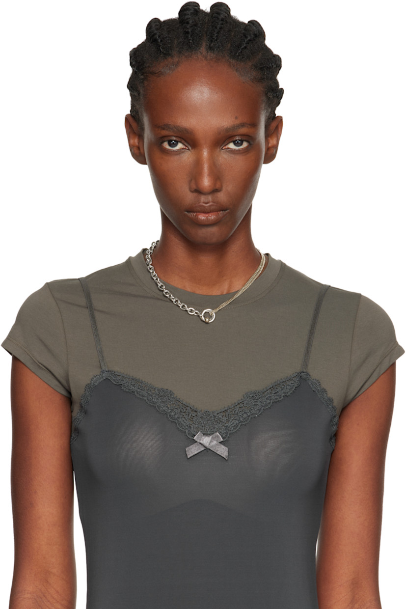 Handcrafted cable chain and tiered curb chain necklace in 24k gold- and palladium-plated brass.

· Charms at drop 
· Logo plaque at adjustable spring-ring fastening 
· L18"

Supplier color: Gold/Palladium