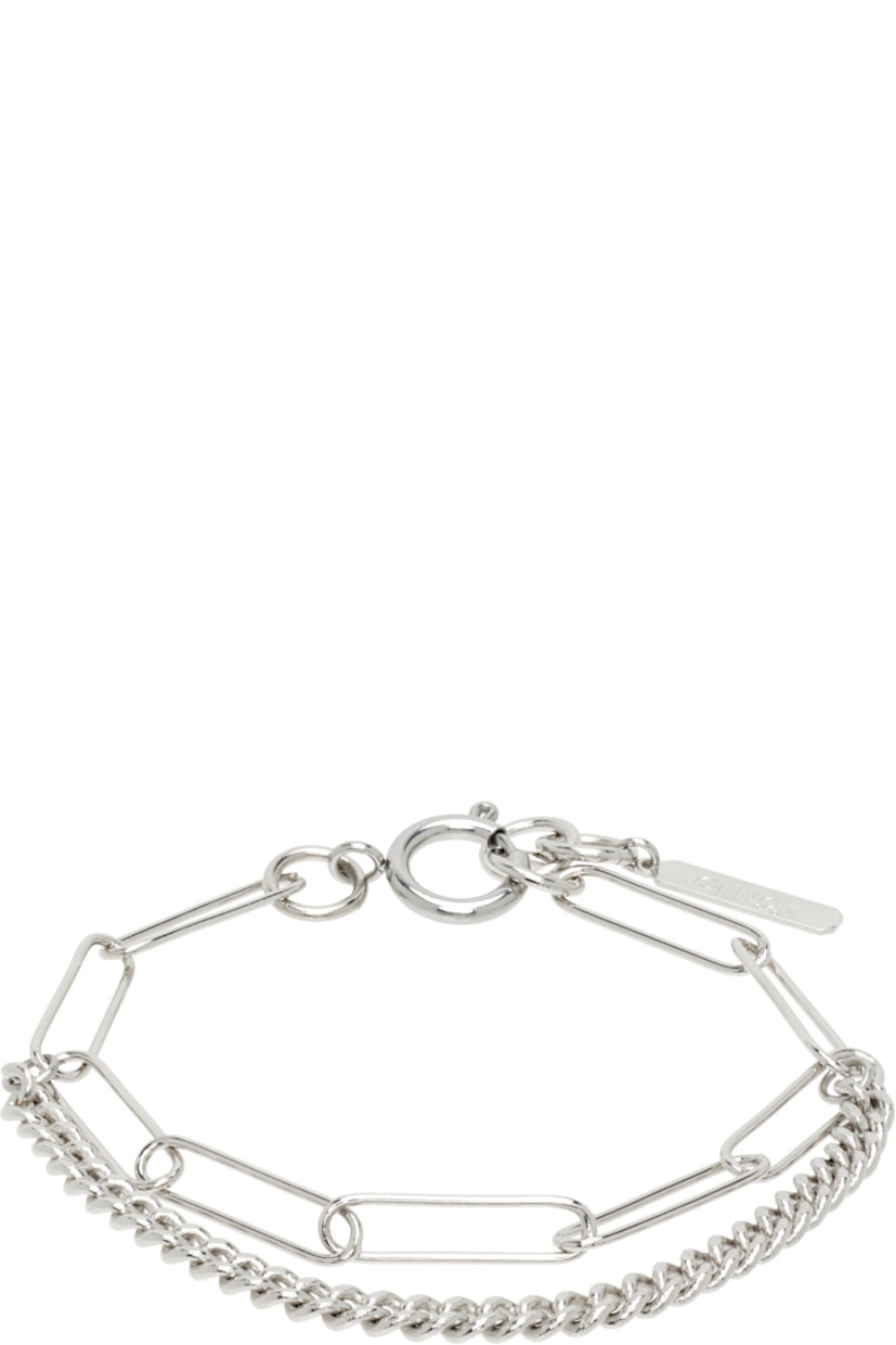 Handcrafted tiered curb and cable chain bracelet in palladium-plated brass.

· Logo plaque at adjustable spring-ring fastening 
· L8"

Available exclusively at SSENSE.

Supplier color: Palladium