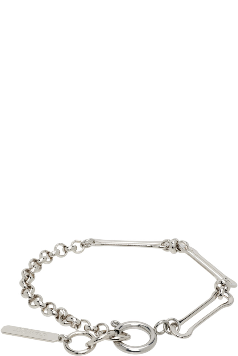 Handcrafted rolo and cable chain bracelet in palladium-plated brass.

· Logo plaque at adjustable spring-ring fastening 
· L7.5"

Supplier color: Palladium