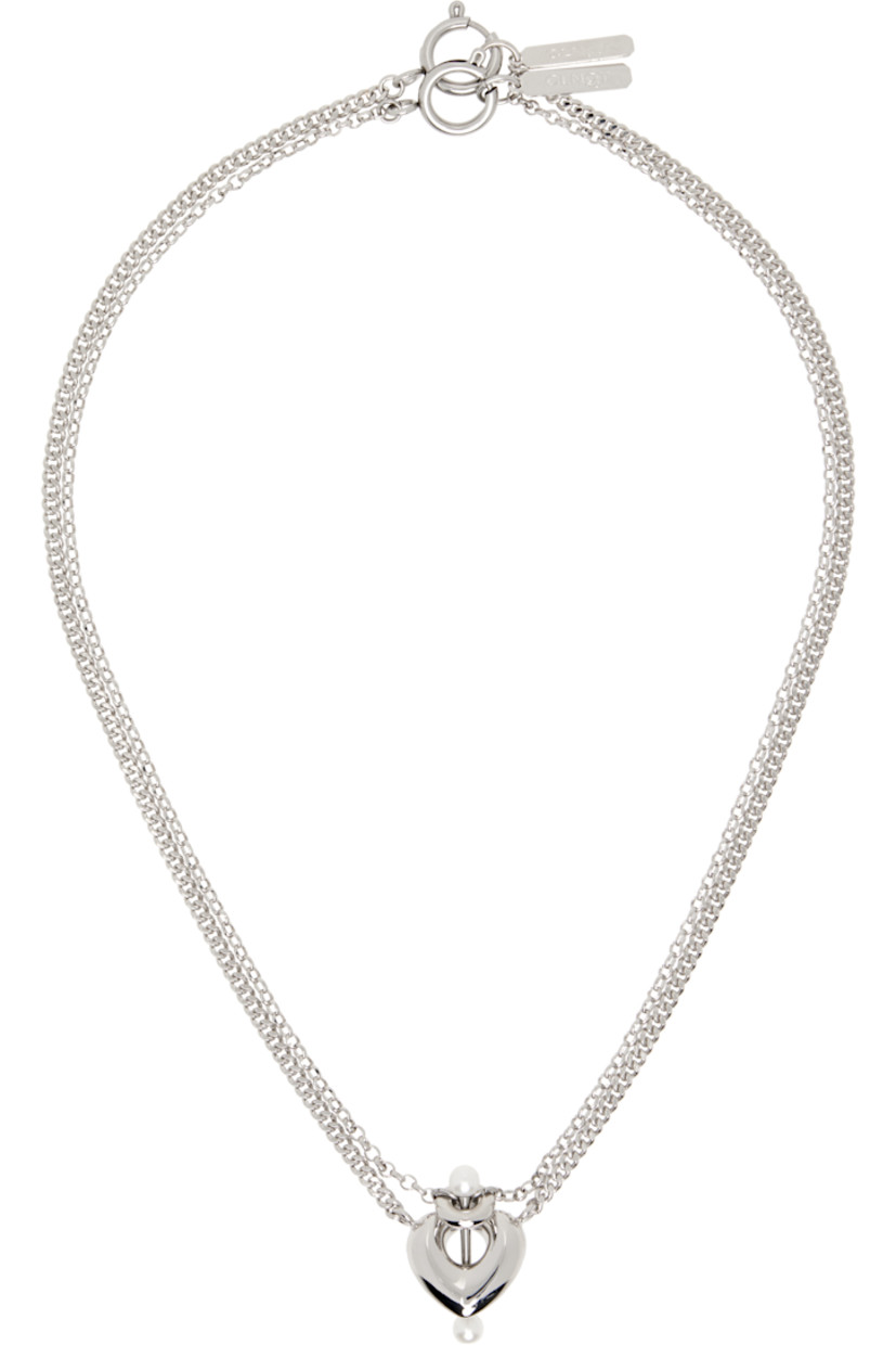 Handcrafted curb chain necklace in palladium-plated brass.

· Detachable cable chain at length
· Graphic charm and charm with faux-pearls at drop
· Logo plaque at spring-ring fastening 
· L17.5"

Supplier color: Palladium