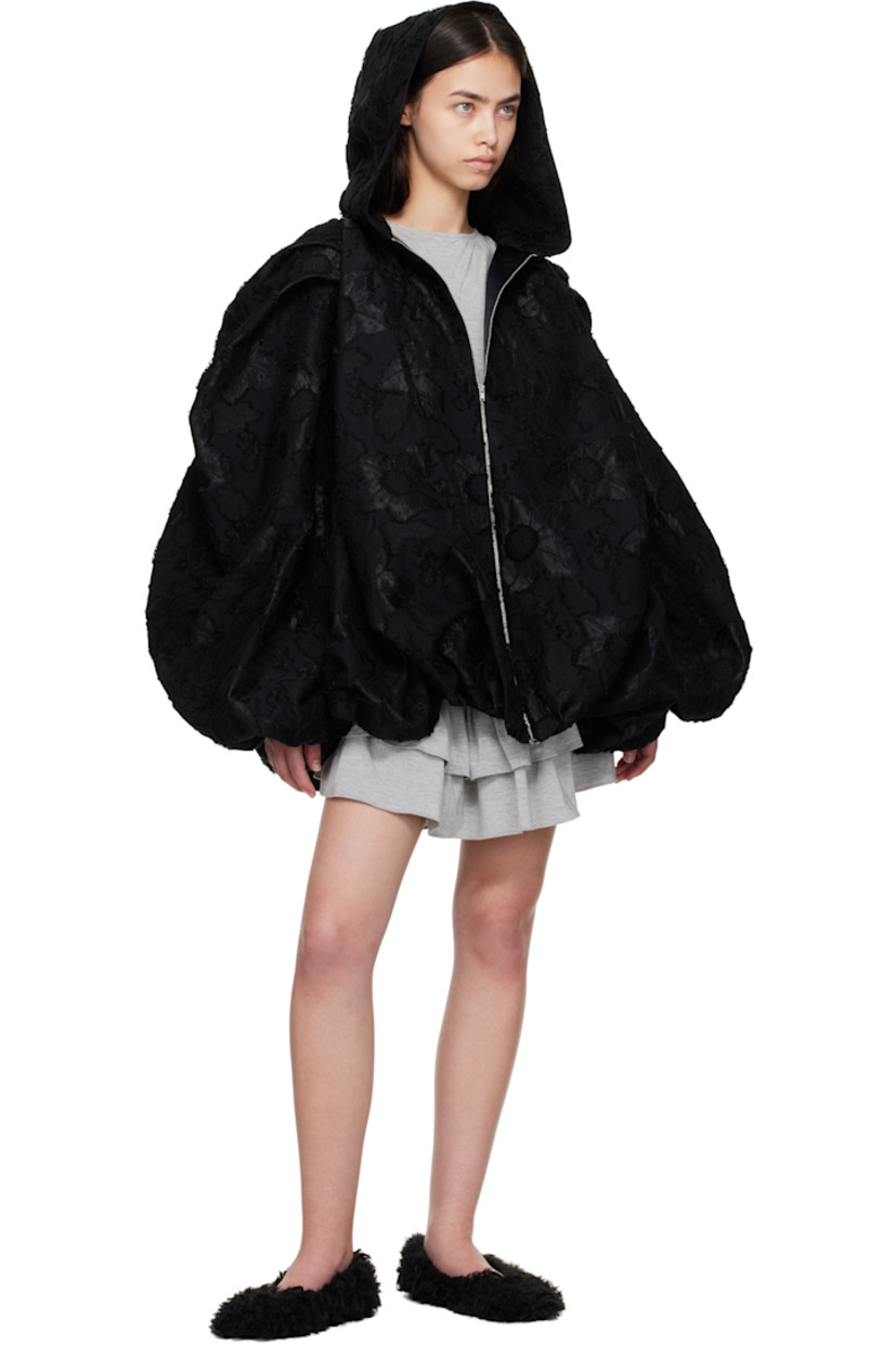 Plain-woven cotton- and cupro-blend jacket. Fil-coupé pattern and gathering throughout.

· Hood at collar
· Two-way zip closure
· Seam pockets
· Bubble hem
· Raglan sleeves
· Full satin lining

Supplier color: Black