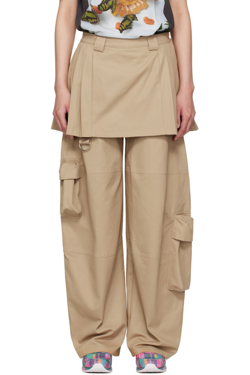 Cotton twill cargo pants. Integrated pleated skirt overlay at waistband.

· Paneled construction
· Belt loops
· Three-pocket styling
· Concealed zip closure at outseam waist
· D-ring at front leg
· Offset cargo pockets 
· Silver-tone hardware

Supplier color: Khaki