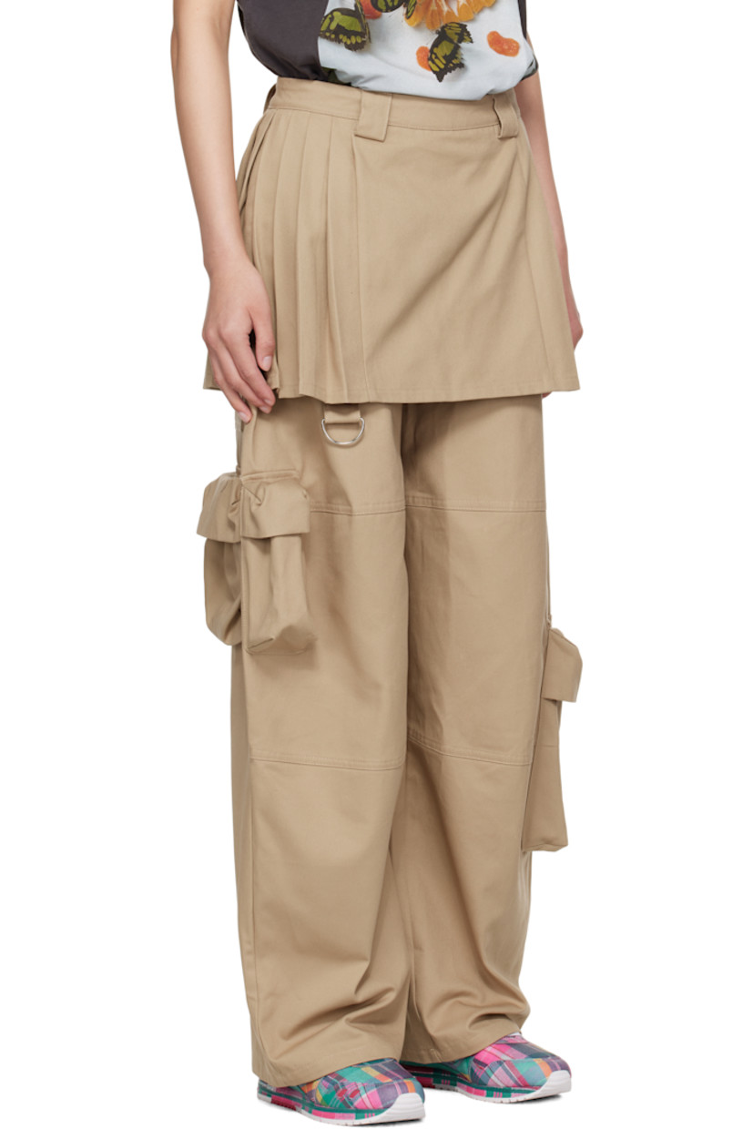 Cotton twill cargo pants. Integrated pleated skirt overlay at waistband.

· Paneled construction
· Belt loops
· Three-pocket styling
· Concealed zip closure at outseam waist
· D-ring at front leg
· Offset cargo pockets 
· Silver-tone hardware

Supplier color: Khaki