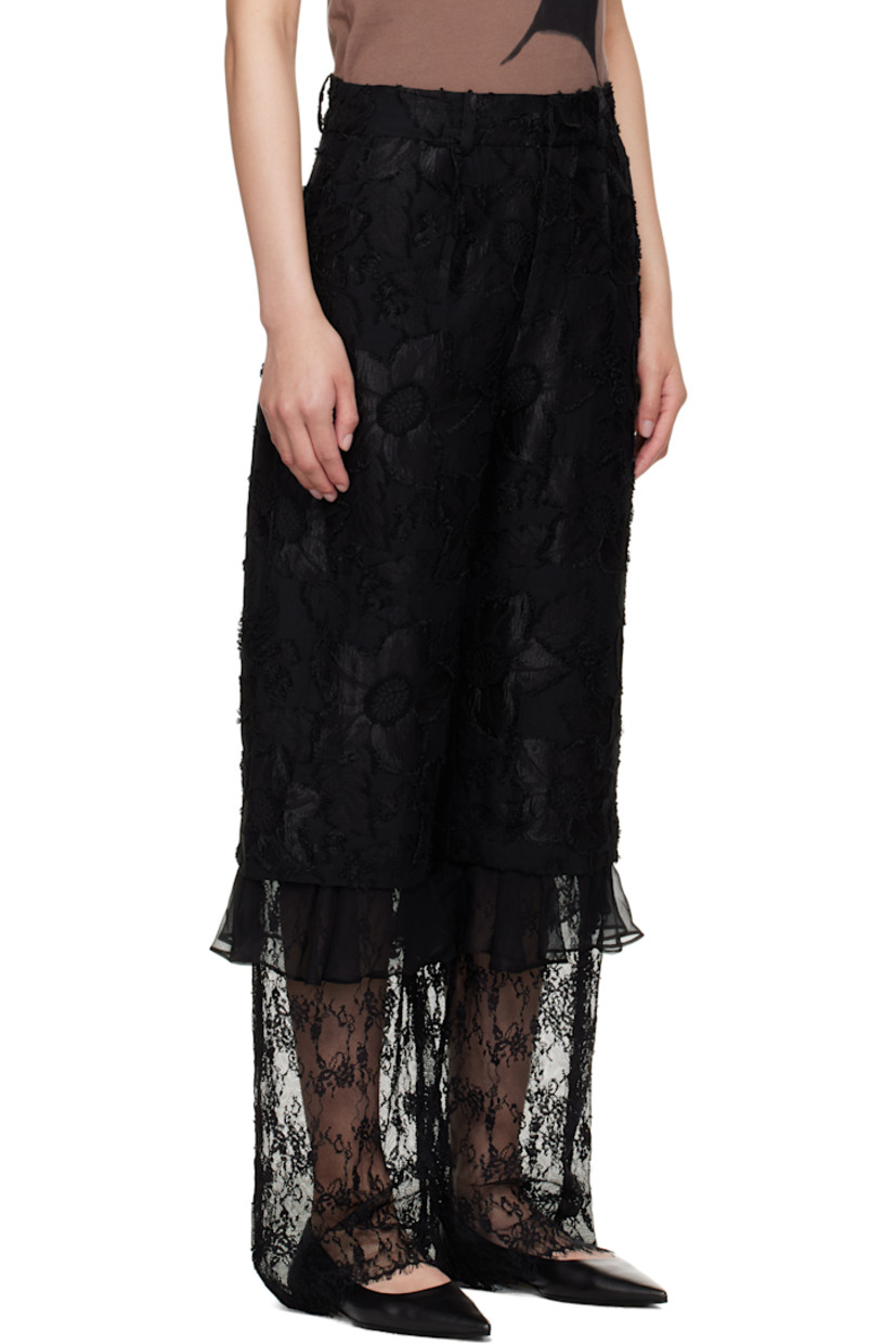 Relaxed-fit woven cotton-blend trousers. Floral fil-coupé pattern throughout.

· Paneled construction
· Mid-rise
· Belt loops
· Four-pocket styling
· Zip fly
· Pleats at front
· Ruffled trim at knees
· Sheer embroidered lace panel at lower legs

Supplier color: Black