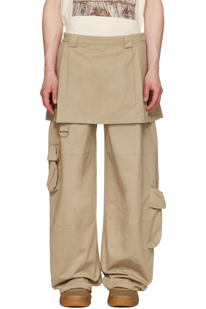 Cotton twill cargo pants. Pleated miniskirt-style overlay. 

· Layered construction 
· Belt loops
· Two-pocket styling
· D-ring at leg
· Cargo pockets
· Zip closure at outseam

Supplier color: Khaki