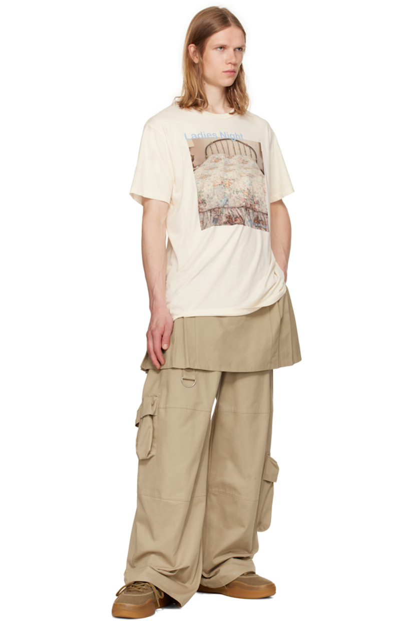 Cotton twill cargo pants. Pleated miniskirt-style overlay. 

· Layered construction 
· Belt loops
· Two-pocket styling
· D-ring at leg
· Cargo pockets
· Zip closure at outseam

Supplier color: Khaki