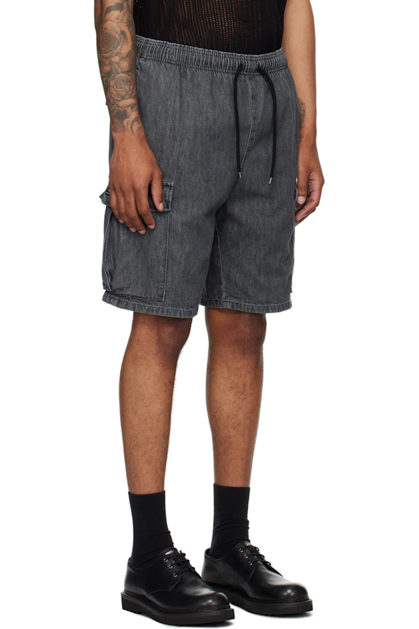 9 oz non-stretch denim shorts. 

· Fading throughout
· Drawstring at elasticized waistband
· Four-pocket styling
· Cargo pocket at outseams
· Logo patch at outseam
· Logo flags at back

Supplier color: Black