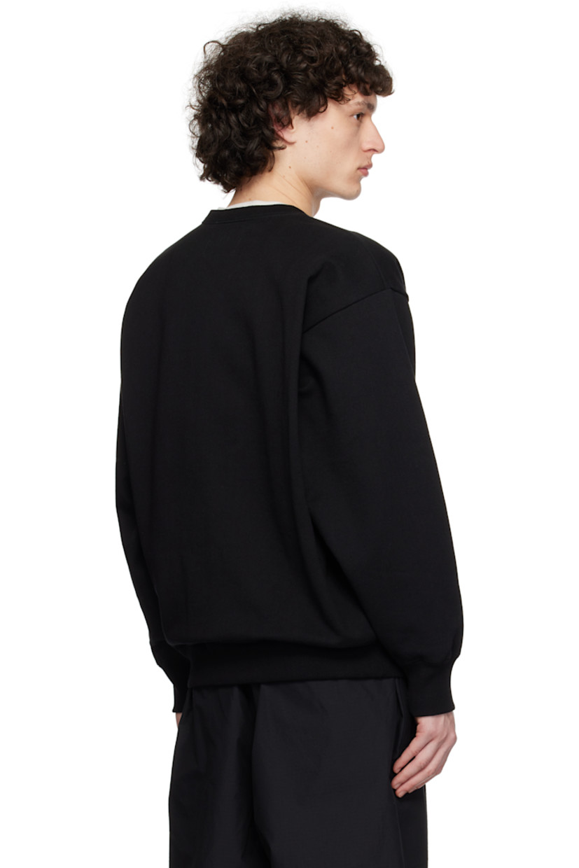 French terry sweatshirt. 

· Rib-knit crewneck, hem, and cuffs
· Text embroidered at chest
· Logo patch at front hem 
· Logo flag at side seam
· Dropped shoulders

Supplier color: Black