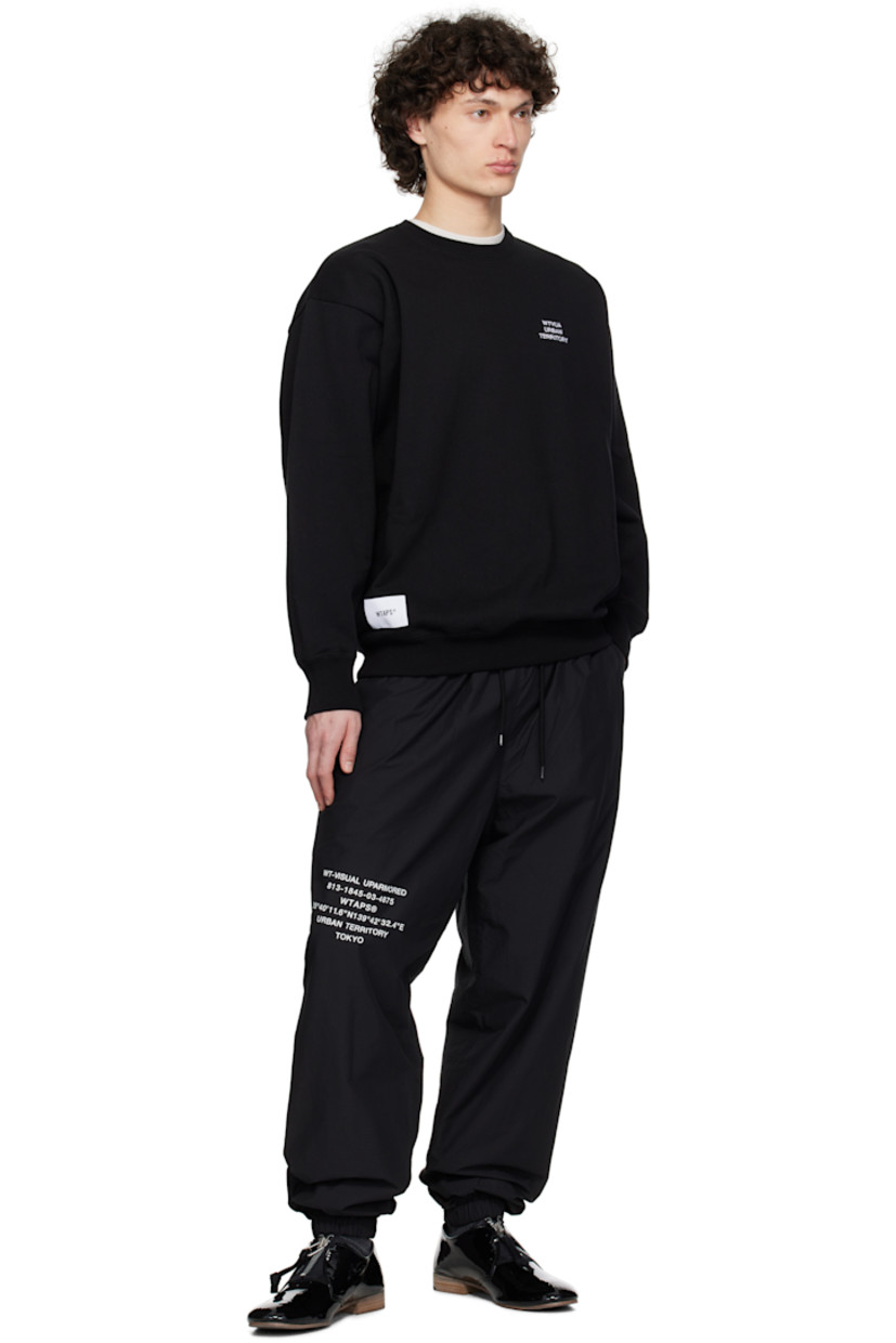 French terry sweatshirt. 

· Rib-knit crewneck, hem, and cuffs
· Text embroidered at chest
· Logo patch at front hem 
· Logo flag at side seam
· Dropped shoulders

Supplier color: Black