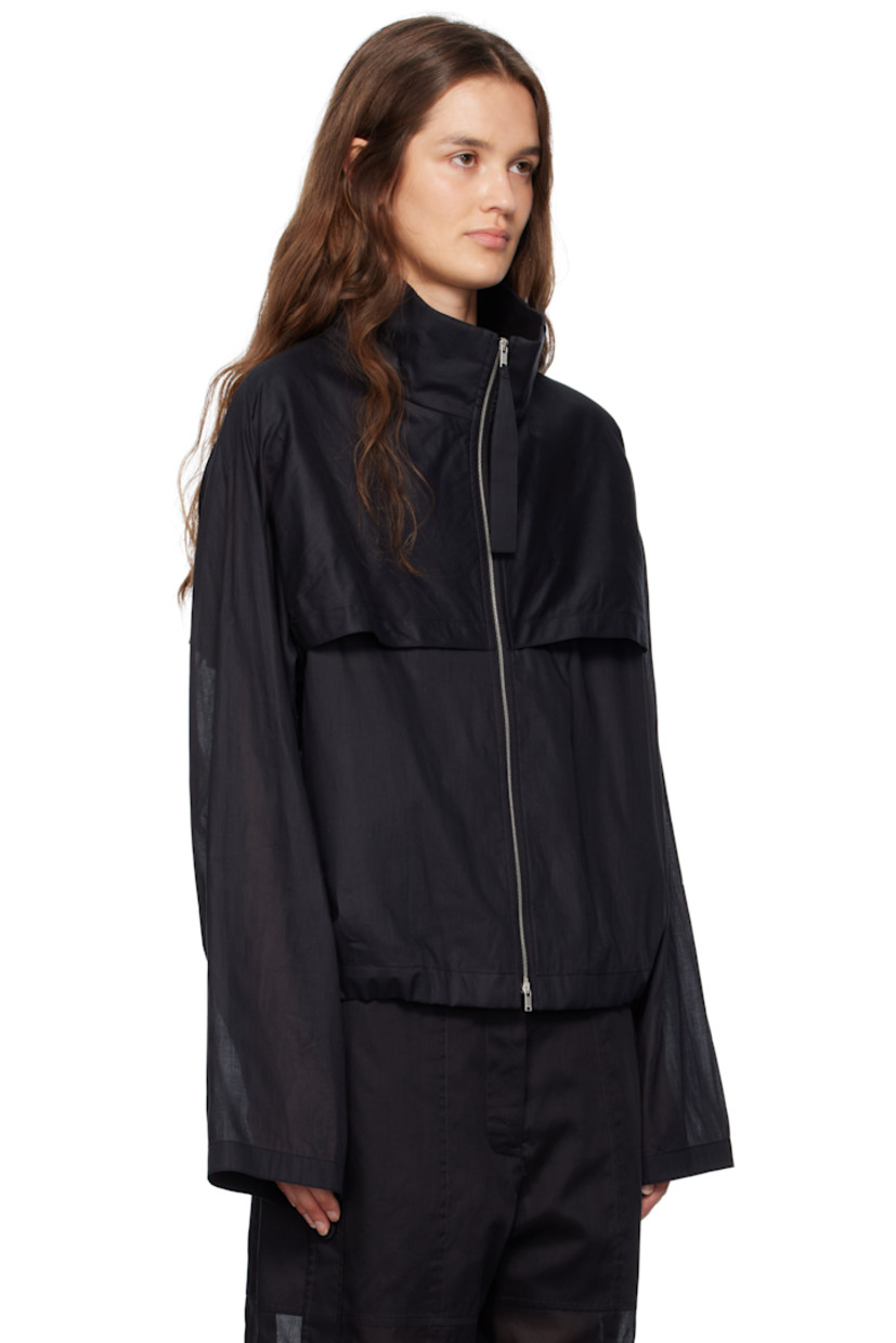 Sheer cotton muslin jacket.

· Paneled construction
· Stand collar
· Two-way zip closure
· Storm flap at front and back
· Zip pockets at waist
· Drawstring at hem
· Unlined

Supplier color: Black