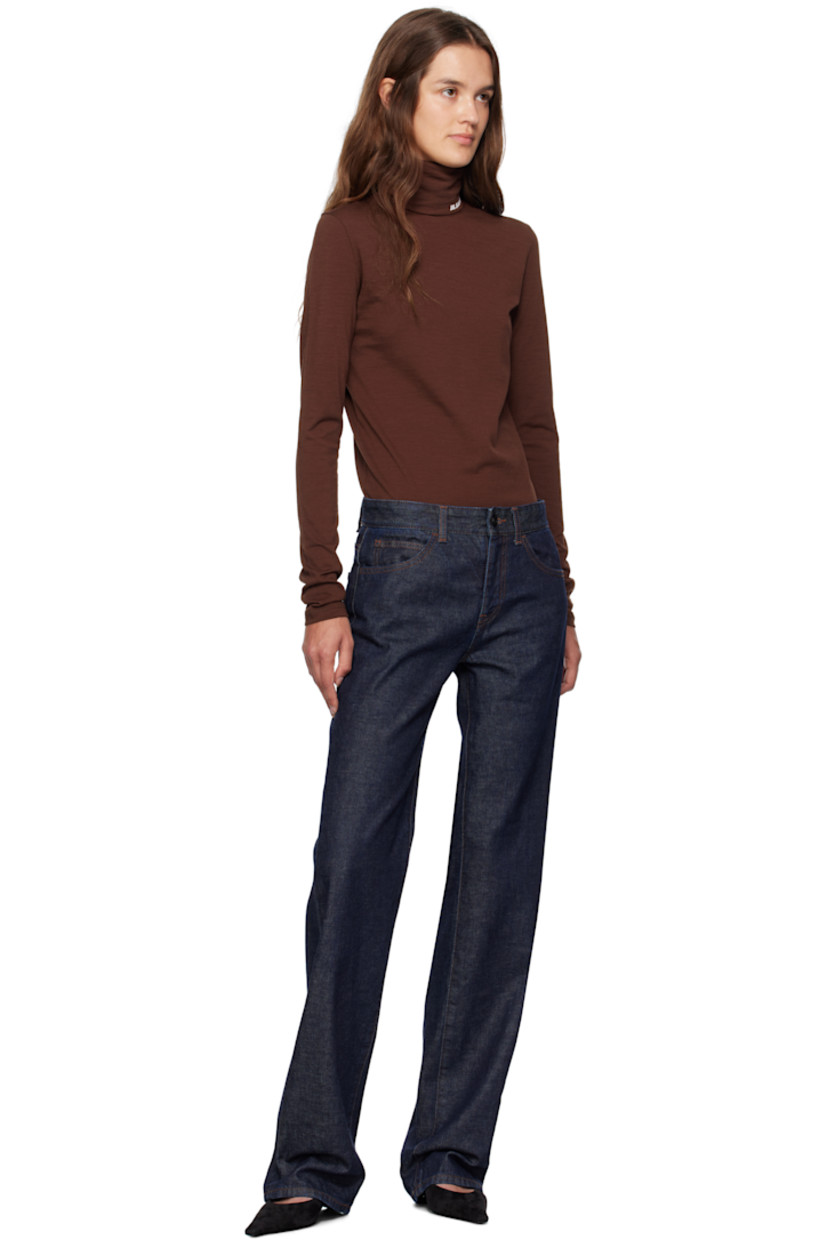 Wool-blend jersey T-shirt. Turtleneck with printed logo at front.

Part of the Jil Sander+ collection.

Supplier color: Plum