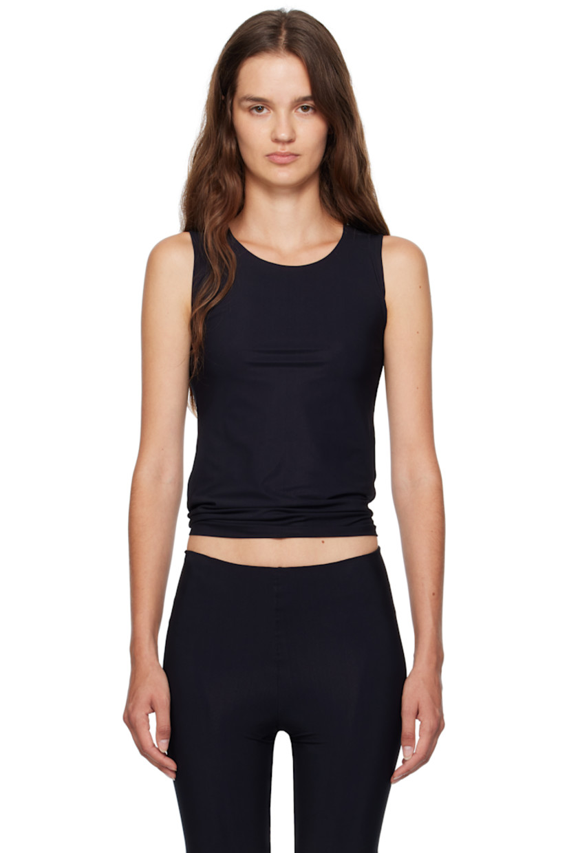 Lightweight stretch nylon jersey tank top. Seamless round neck and armscyes.

Supplier color: Black
