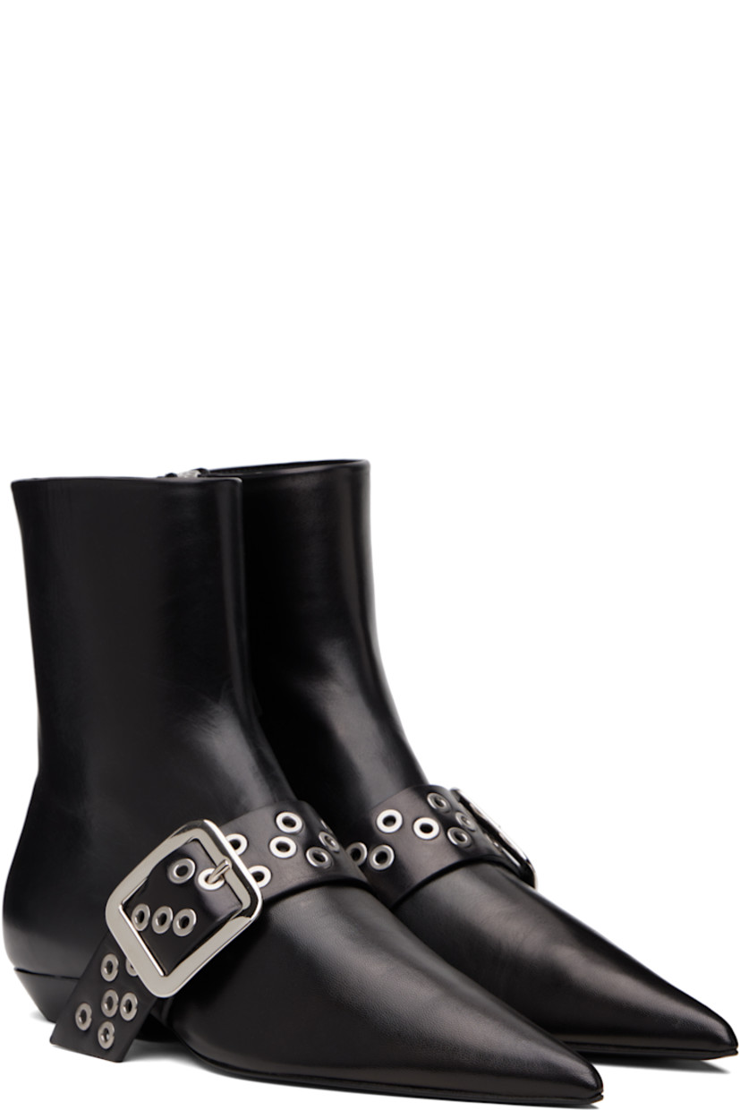 Ankle-high grained goatskin boots.

· Pointed toe 
· Pin-buckle strap with grommets at vamp
· Zip closure at inner side
· Stacked leather block heel 
· Leather sole with rubber injections 

Supplier color: Black