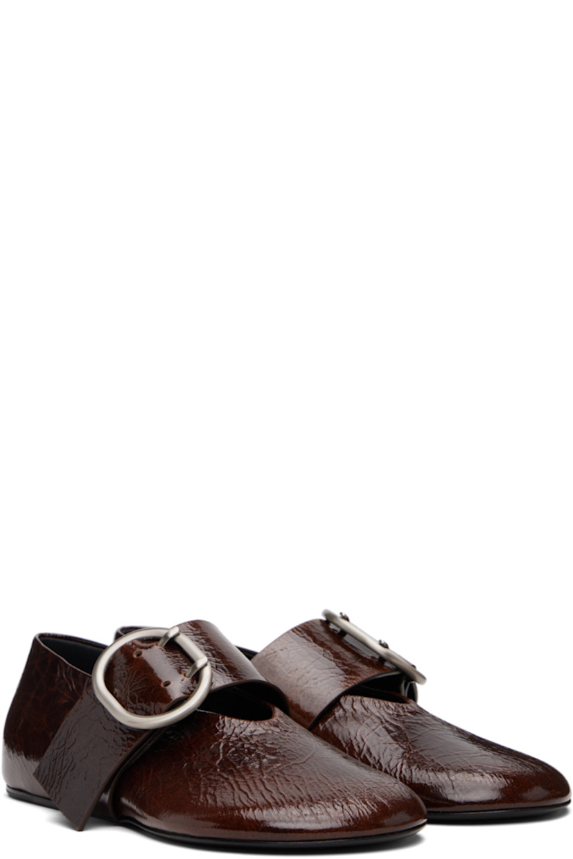 Crackled patent goatskin ballerina flats.

· Modified round toe
· Pin-buckle strap at vamp
· Leather sole with rubber injections 

Supplier color: Dark earth