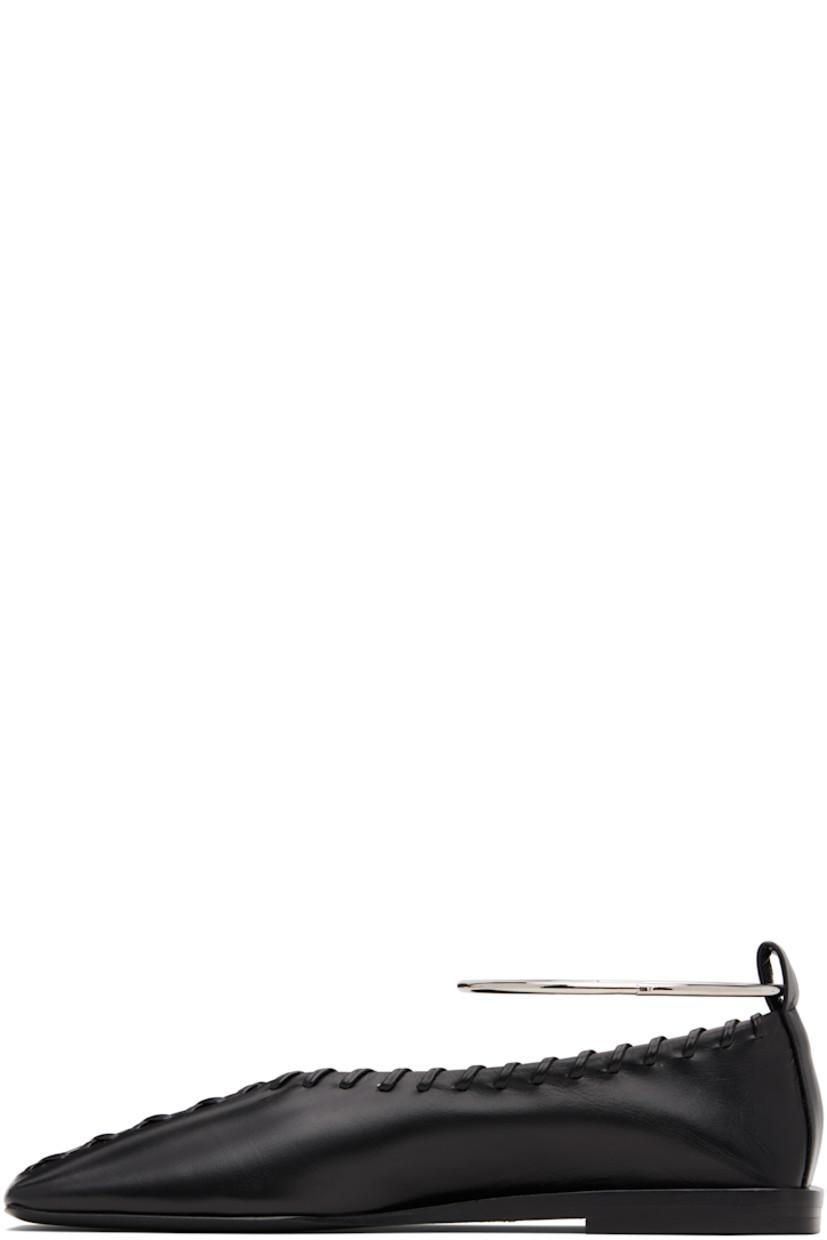 Grained goatskin ballerina flats.

· Square toe 
· Leather stitching at vamp and collar 
· Hinged metal ankle cuff
· Stacked leather midsole 
· Leather sole with rubber injections

Supplier color: Black/Silver