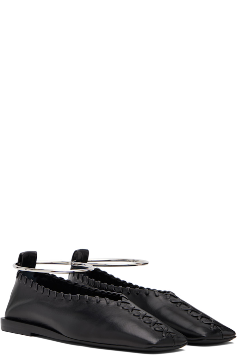 Grained goatskin ballerina flats.

· Square toe 
· Leather stitching at vamp and collar 
· Hinged metal ankle cuff
· Stacked leather midsole 
· Leather sole with rubber injections

Supplier color: Black/Silver