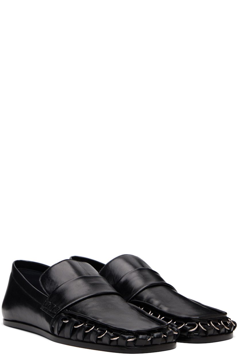Grained sheepskin loafers.

· Square toe 
· Cutouts with D-rings at toe and sides
· Strap at vamp
· Leather sole with rubber injections 

Supplier color: Black
