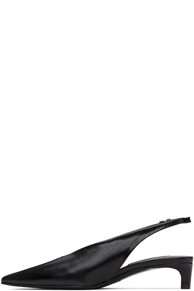 Grained calfskin heels. 

· Pointed toe 
· Stitch at vamp
· Pin-buckle slingback strap
· Covered kitten heel
· Leather sole with rubber injections
· Heel: H1.5"

Supplier color: Black