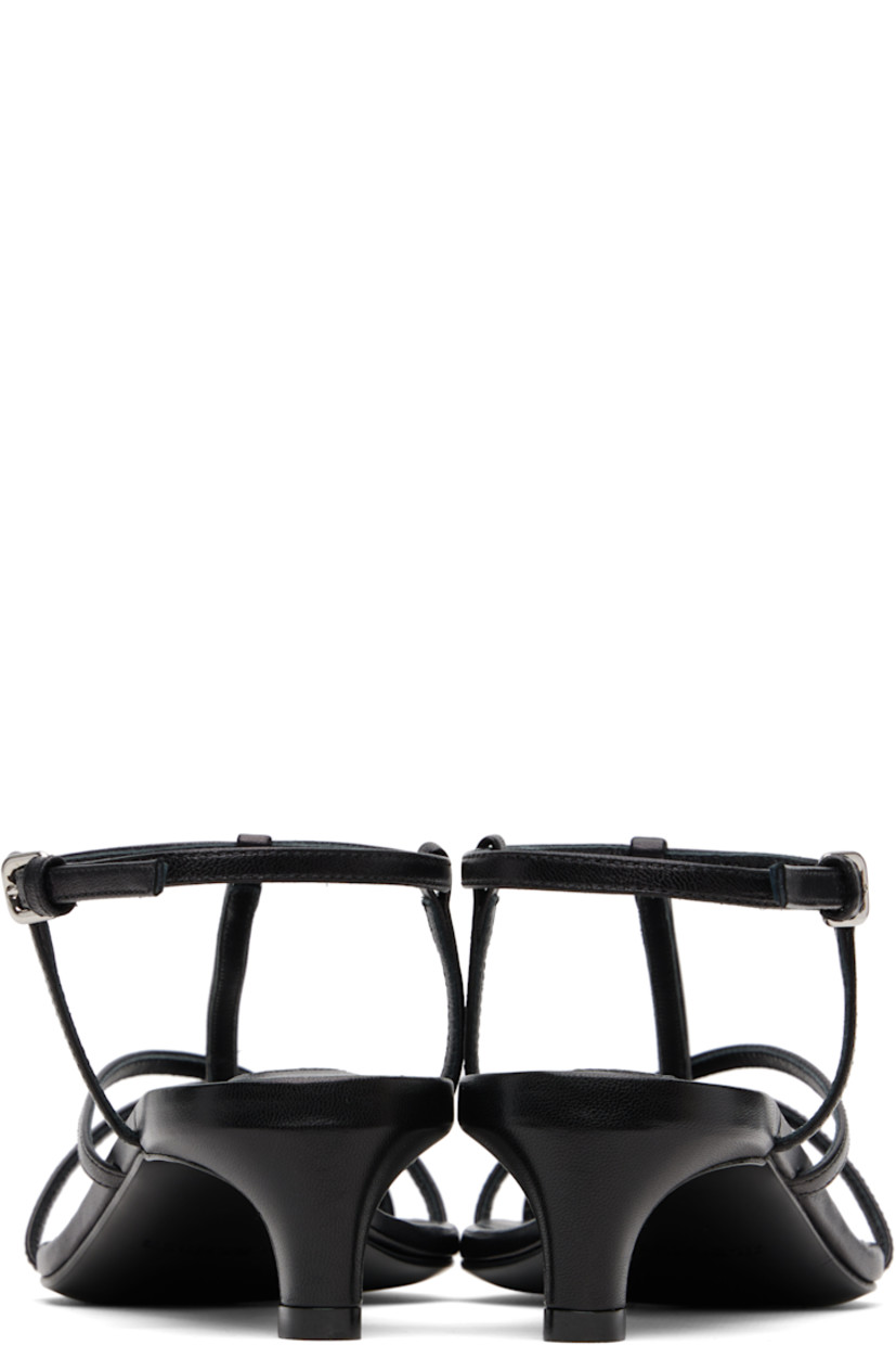 Buffed goatskin heeled sandals.

· Pointed open toe 
· Pin-buckle ankle strap
· Covered kitten heel 
· Leather sole with rubber injections
· Heel: H1.5"

Supplier color: Black