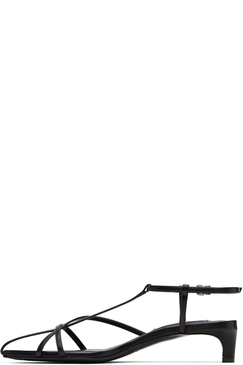 Buffed goatskin heeled sandals.

· Pointed open toe 
· Pin-buckle ankle strap
· Covered kitten heel 
· Leather sole with rubber injections
· Heel: H1.5"

Supplier color: Black