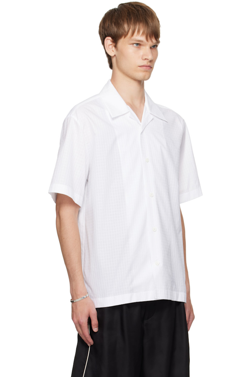 Cotton ripstop shirt.

· Open spread collar
· Button closure

Supplier color: Optic white