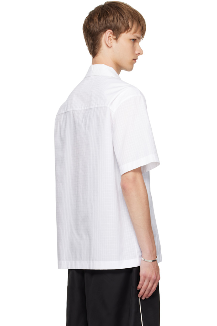 Cotton ripstop shirt.

· Open spread collar
· Button closure

Supplier color: Optic white
