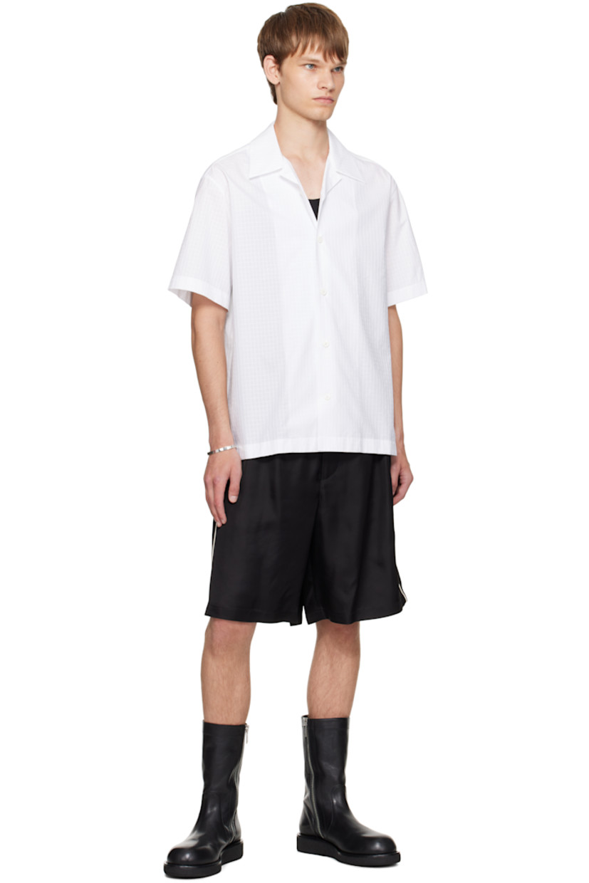 Cotton ripstop shirt.

· Open spread collar
· Button closure

Supplier color: Optic white