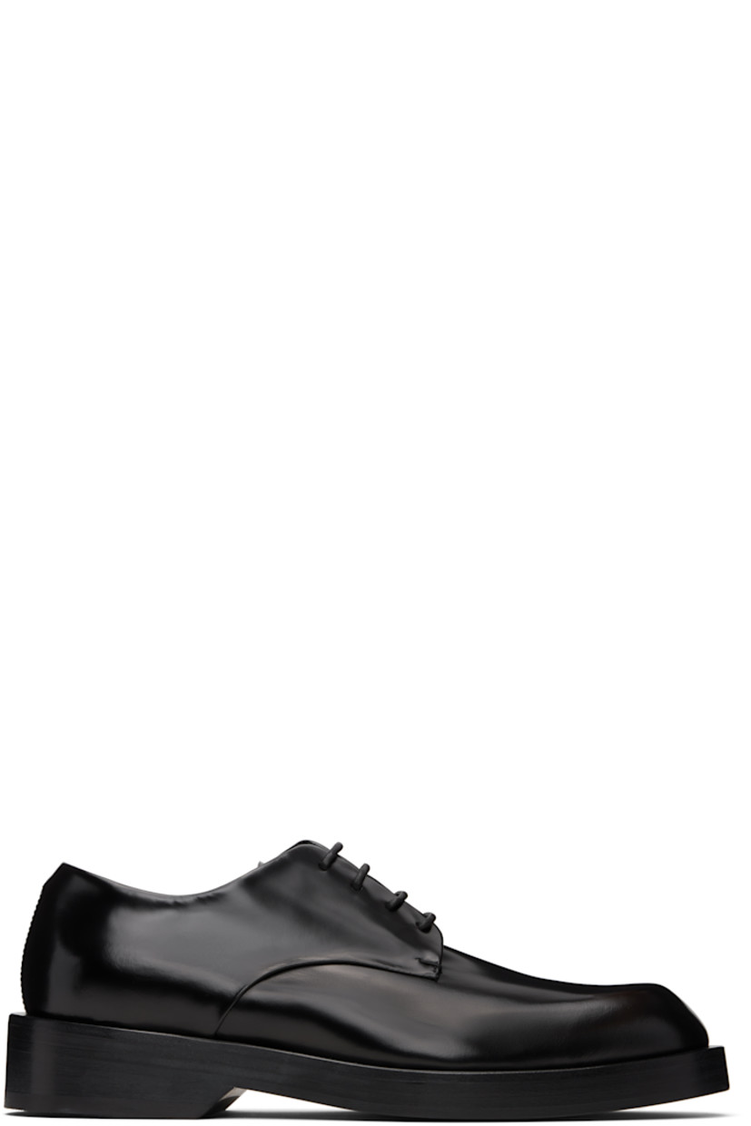Buffed calfskin derbys.

· Lace-up closure
· Stacked leather midsole and block heel
· Leather sole with rubber injections 
· Heel: H1.25"

Supplier color: Black