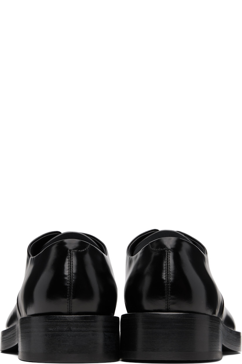 Buffed calfskin derbys.

· Lace-up closure
· Stacked leather midsole and block heel
· Leather sole with rubber injections 
· Heel: H1.25"

Supplier color: Black