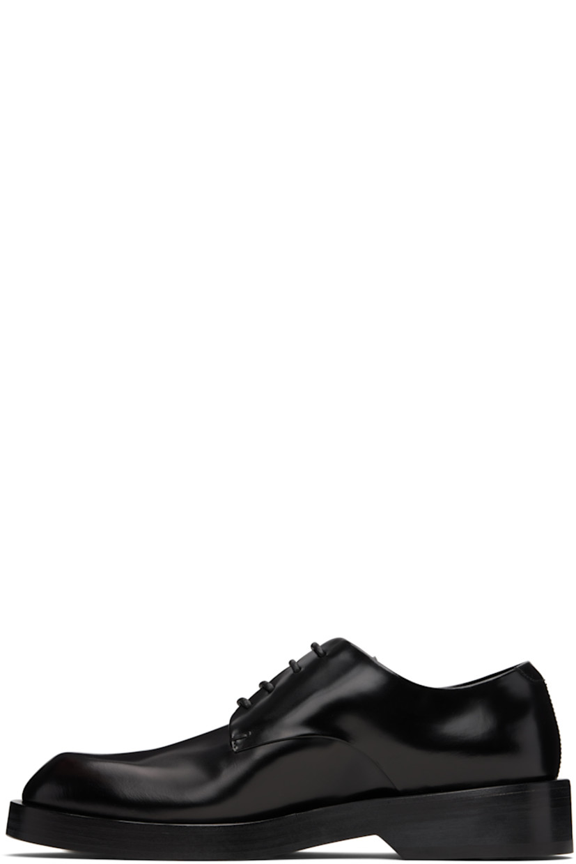 Buffed calfskin derbys.

· Lace-up closure
· Stacked leather midsole and block heel
· Leather sole with rubber injections 
· Heel: H1.25"

Supplier color: Black