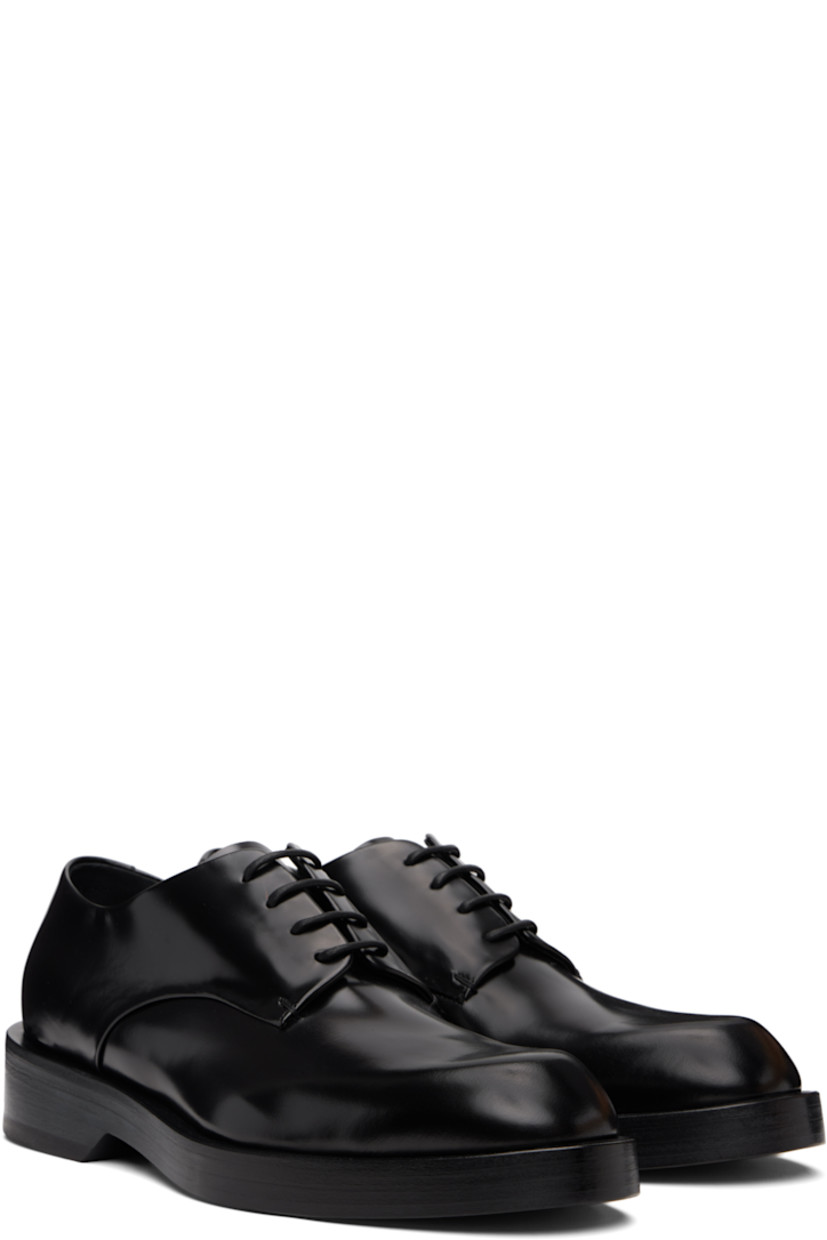 Buffed calfskin derbys.

· Lace-up closure
· Stacked leather midsole and block heel
· Leather sole with rubber injections 
· Heel: H1.25"

Supplier color: Black