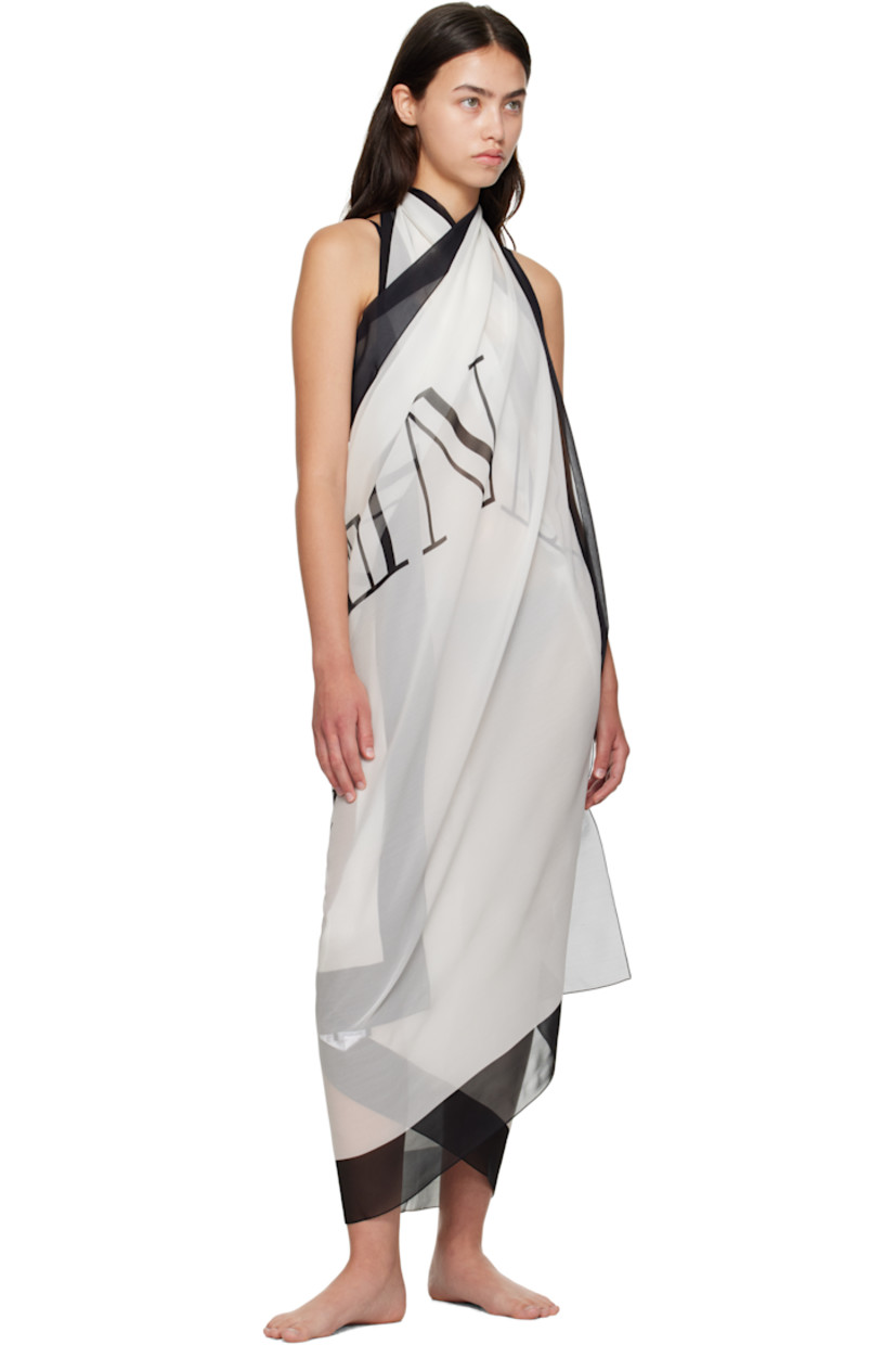 Sheer silk crêpe cover-up dress. 

· Logo pattern printed throughout
· Self-tie halter neck

Supplier color: White/Black