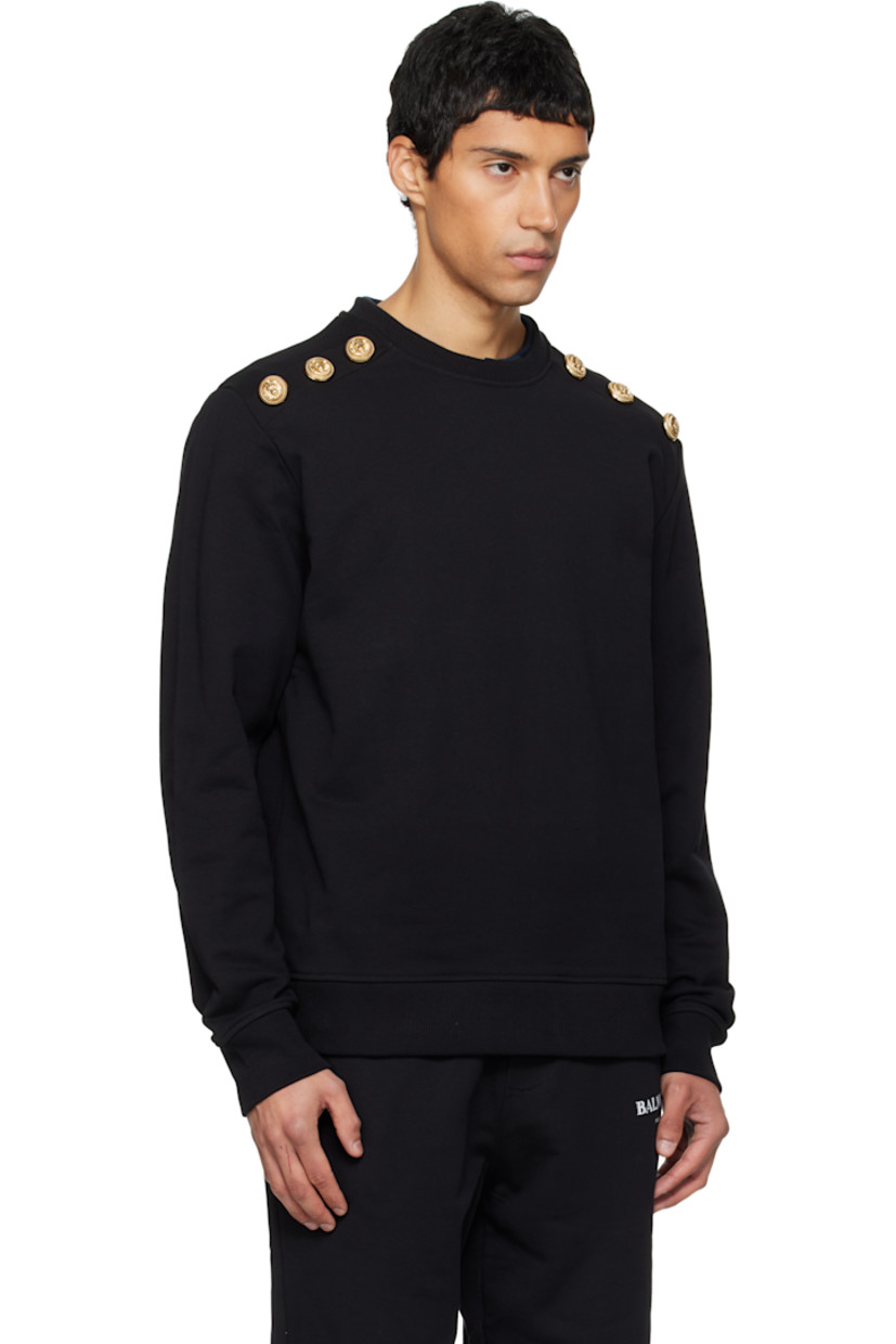 French terry sweatshirt.

· Rib-knit crewneck, hem, and cuffs
· Logo-engraved graphic hardware at shoulders
· Dropped shoulders
· Gold-tone hardware

Supplier color: Black