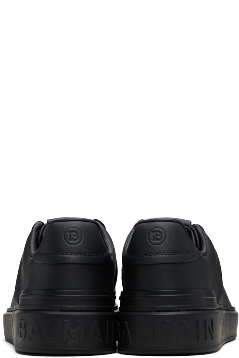 Low-top buffed calfskin sneakers.

· Lace-up closure
· Logo patch at padded tongue
· Padded collar 
· Logo stamp at outer side
· Logo embossed at heel tab and counter 
· Treaded rubber sole 

Supplier color: Black