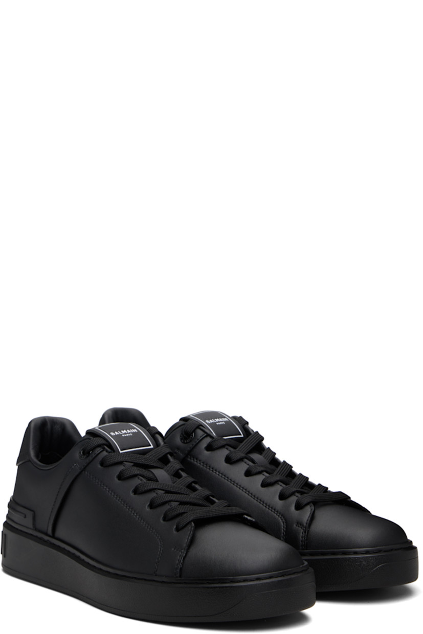 Low-top buffed calfskin sneakers.

· Lace-up closure
· Logo patch at padded tongue
· Padded collar 
· Logo stamp at outer side
· Logo embossed at heel tab and counter 
· Treaded rubber sole 

Supplier color: Black
