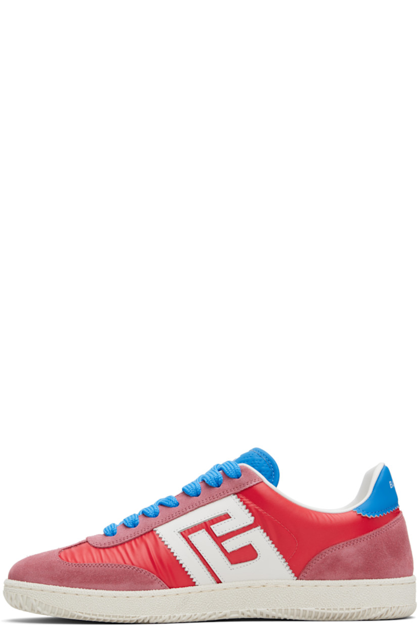 Low-top calfskin suede, taffeta, and buffed calfskin sneakers.

· Serrated edges throughout
· Lace-up closure
· Logo embossed at padded tongue
· Padded collar
· Logo patch at sides
· Logo stamp at outer side and heel tab
· Buffed leather lining
· Treaded rubber sole

Supplier color: Red