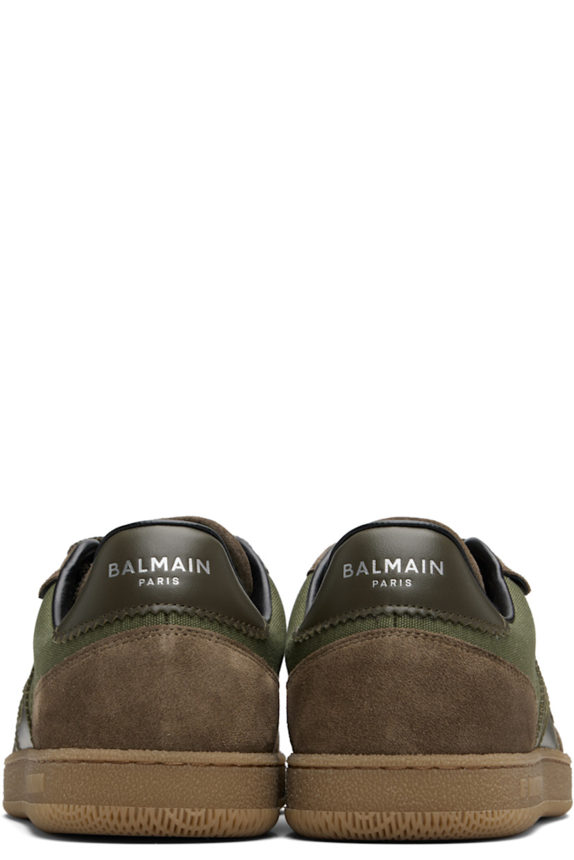 Low-top calfskin suede and cotton canvas sneakers.

· Serrated edges throughout
· Lace-up closure
· Logo embossed at padded tongue
· Padded collar
· Logo patch at sides
· Logo stamp at outer side and heel tab
· Buffed leather lining
· Treaded rubber sole

Supplier color: Khaki