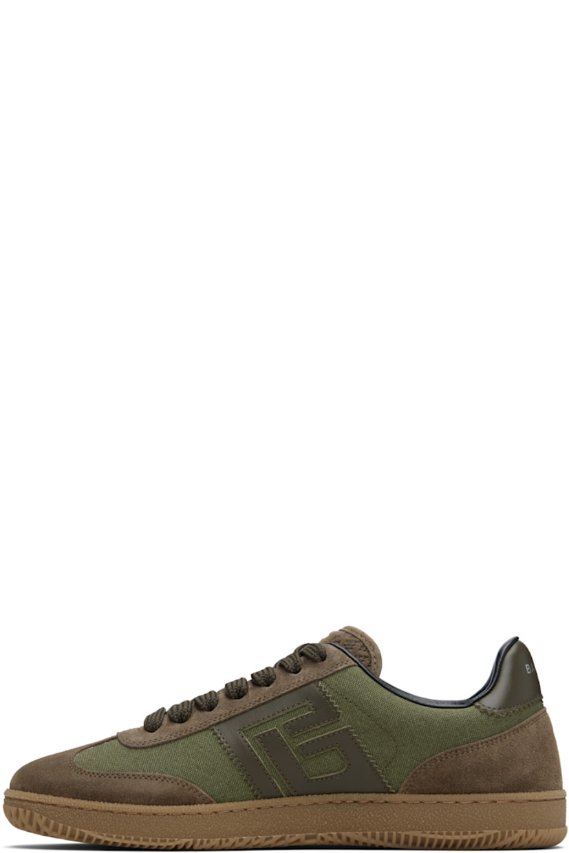 Low-top calfskin suede and cotton canvas sneakers.

· Serrated edges throughout
· Lace-up closure
· Logo embossed at padded tongue
· Padded collar
· Logo patch at sides
· Logo stamp at outer side and heel tab
· Buffed leather lining
· Treaded rubber sole

Supplier color: Khaki