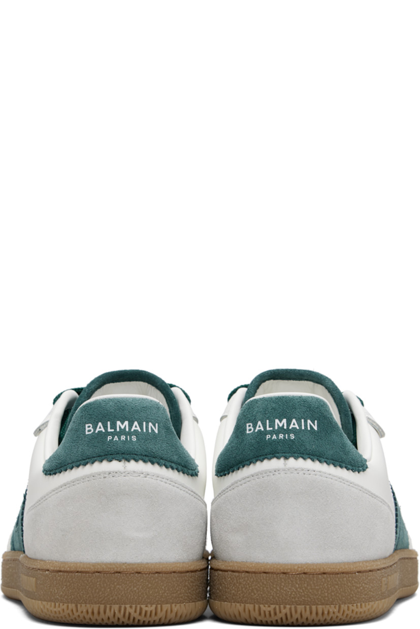 Low-top calfskin suede and buffed calfskin sneakers.

· Serrated edges throughout
· Lace-up closure
· Logo embossed at padded tongue
· Padded collar
· Logo patch at sides
· Logo stamp at outer side and heel tab
· Buffed leather lining
· Treaded rubber sole

Supplier color: White