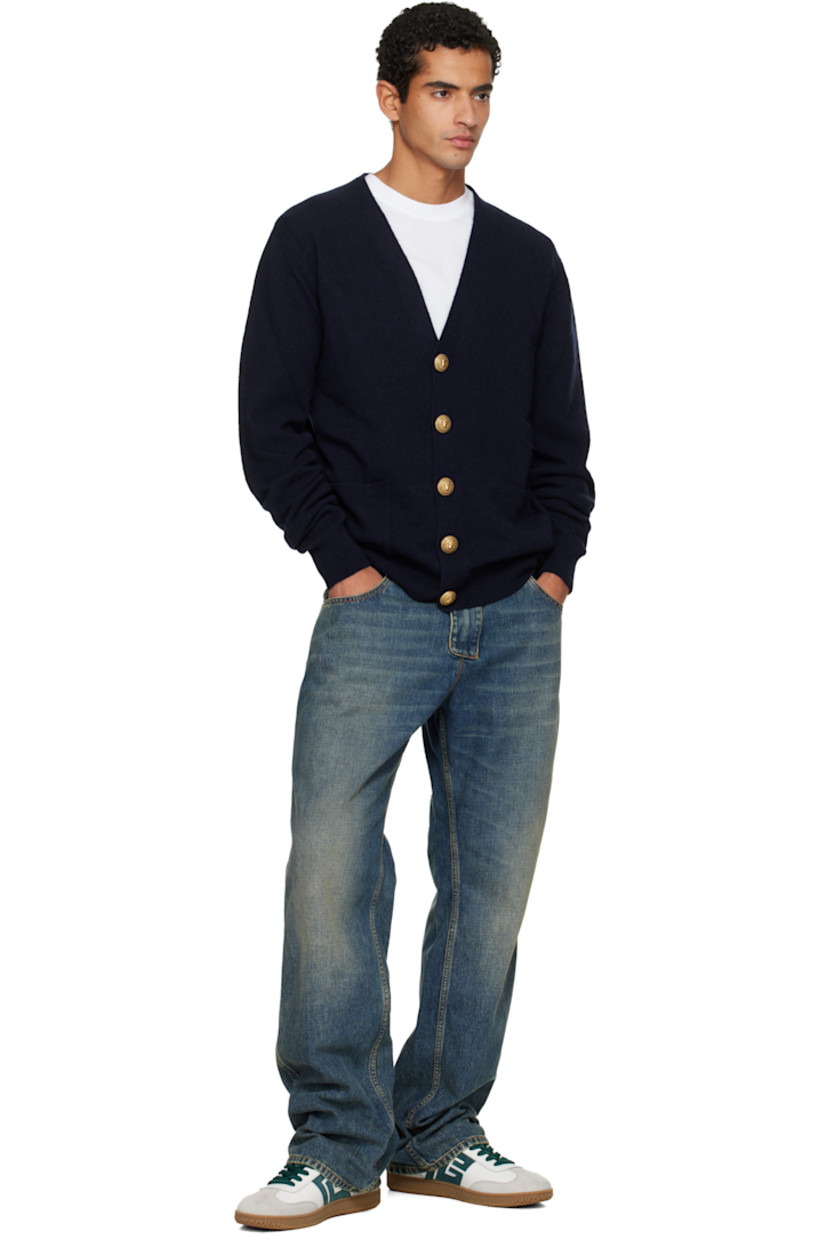 Low-top calfskin suede and buffed calfskin sneakers.

· Serrated edges throughout
· Lace-up closure
· Logo embossed at padded tongue
· Padded collar
· Logo patch at sides
· Logo stamp at outer side and heel tab
· Buffed leather lining
· Treaded rubber sole

Supplier color: White