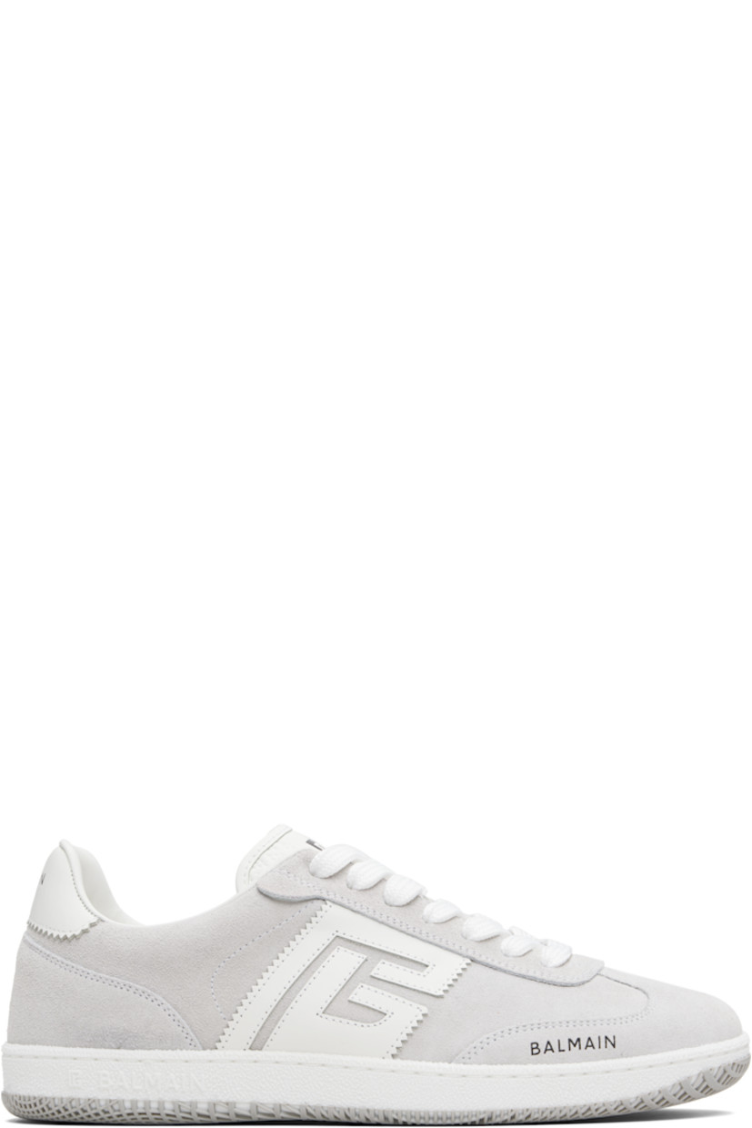 Low-top calfskin suede and cotton canvas sneakers.

· Serrated edges throughout
· Lace-up closure
· Logo embossed at padded tongue
· Padded collar
· Logo patch at sides
· Logo stamp at outer side and heel tab
· Buffed leather lining
· Treaded rubber sole

Supplier color: White