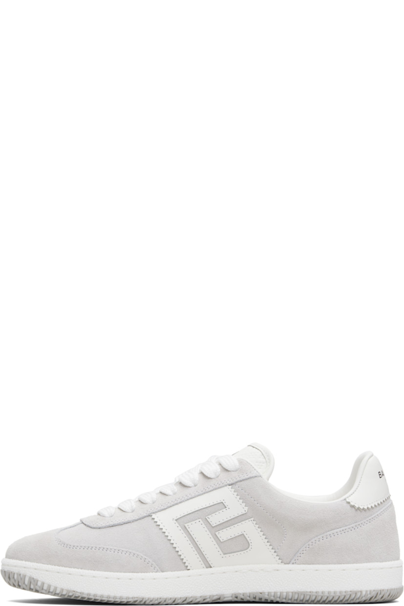 Low-top calfskin suede and cotton canvas sneakers.

· Serrated edges throughout
· Lace-up closure
· Logo embossed at padded tongue
· Padded collar
· Logo patch at sides
· Logo stamp at outer side and heel tab
· Buffed leather lining
· Treaded rubber sole

Supplier color: White